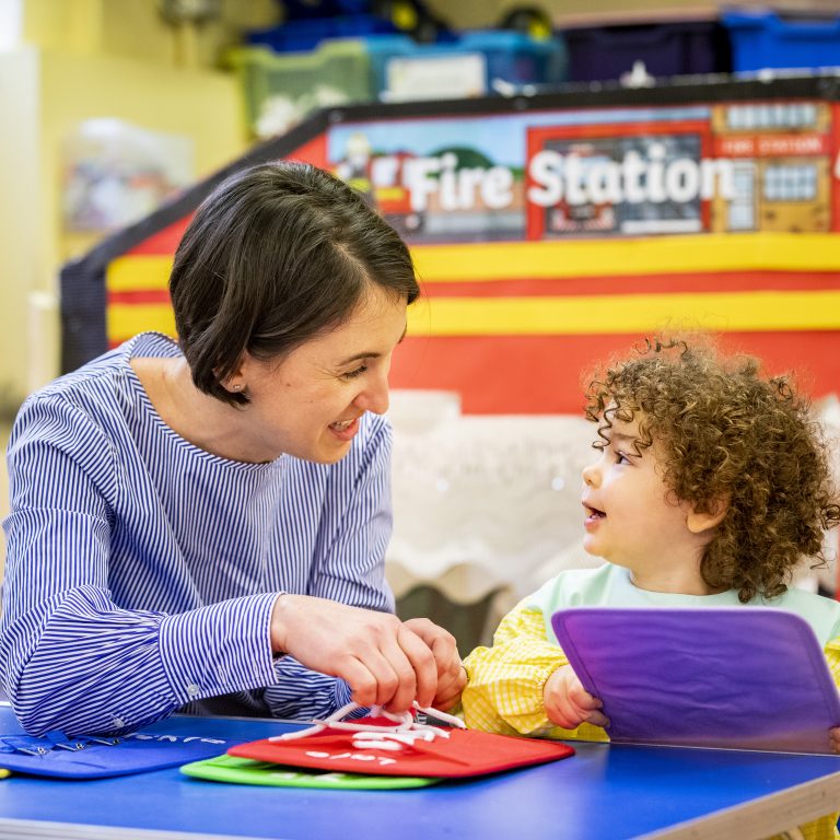 boy and teacher learning