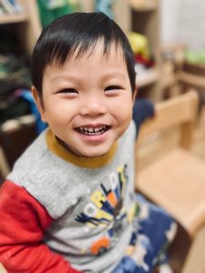 young boy smiling