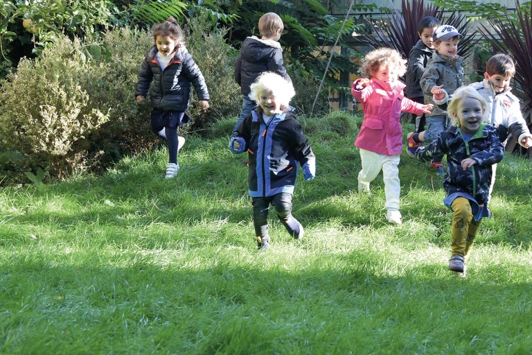 children running across the field