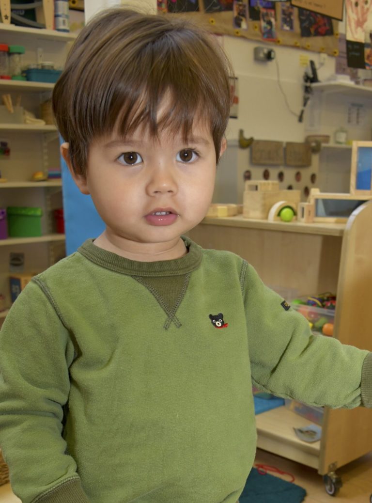 boy with khaki jumper on