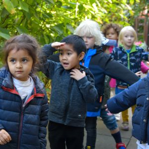 children running across the gardens