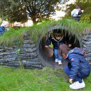 children enjoying the tunnel