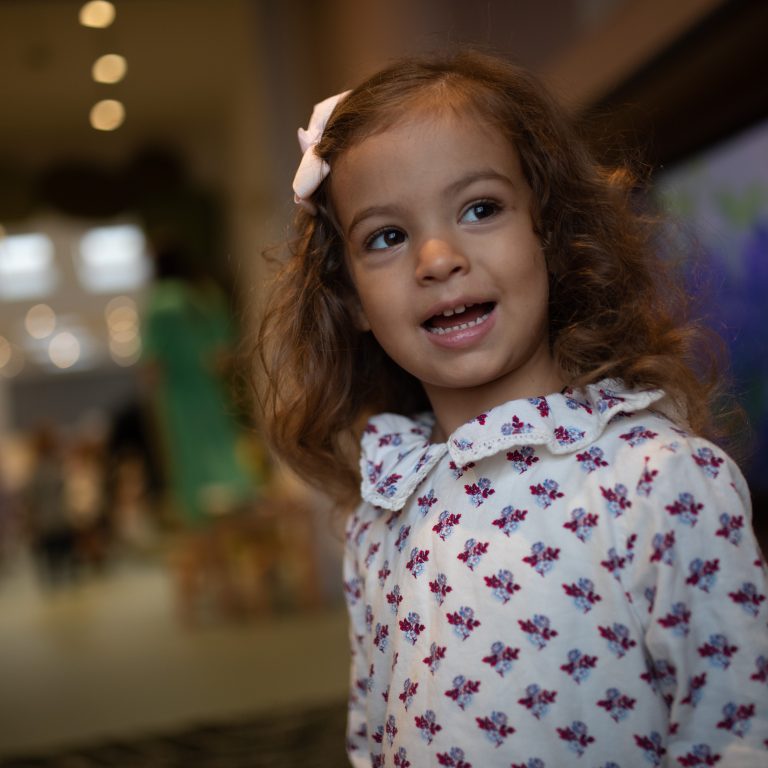 little girl with a bow in her hair