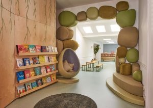 arch way and bookshelf leading to another room