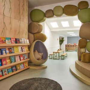 arch way and bookshelf leading to another room